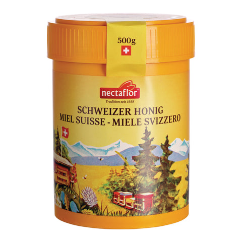 Gelber Honigbehälter mit oranger Deckel und Schweizer Alpenlandschaft sowie der Aufschrift 'nectaflor SCHWEIZER HONIG MIEL SUISSE - MIELE SVIZZERO'