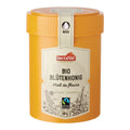 Gelber Honigbehälter mit Aufkleber 'nectaflor BIO BLÜTENHONIG Miel de fleurs kristallin - cristallisé' und Fairtrade-Siegel