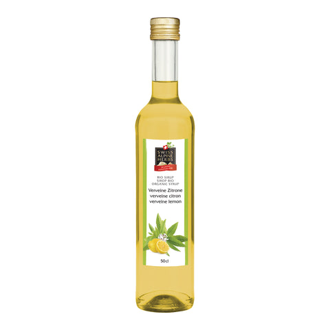 Glasflasche mit goldfarbenem Schraubverschluss und hellgelber Flüssigkeit. Auf dem Etikett steht „Verveine Zitrone / verveine citron / verveine lemon“ unter dem Swiss Alpine Herbs Logo. Unten sind grüne Blätter und Zitronen sowie das Bio-Logo zu sehen.
