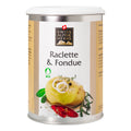 Weisse Gewürzdose mit goldenen Seitenstreifen. In der Mitte steht „Raclette & Fondue“ unter dem Swiss Alpine Herbs Logo. Unten sind Kartoffeln, Zwiebelringe, rote Chilischoten, Kräuter sowie das Bio-Logo abgebildet.