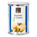 Weisse Gewürzdose mit blauen Seitenstreifen. In der Mitte steht „Raclette & Gratin“ unter dem Swiss Alpine Herbs Logo. Unten sind geschmolzener Käse, Kartoffeln, Essiggurken sowie das Bio-Logo abgebildet.