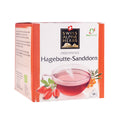 Packung mit Swiss Alpine Herbs Alpenkräutertee Hagebutte-Sanddorn mit Abbildung einer Teetasse und Früchten