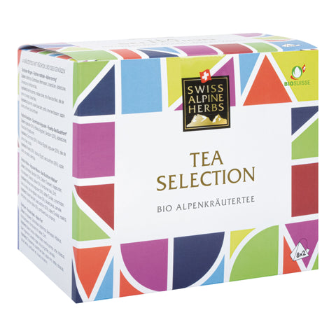 Bunte Verpackung mit dem Schriftzug 'SWISS ALPINE HERBS TEA SELECTION BIO ALPENKRÄUTERTEE' und Bio Suisse-Logo