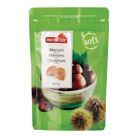 Grüne Verpackung mit der Aufschrift 'nectaflor', 'Marroni gekocht Marrons cuits Chestnuts cooked 500g' und Abbildung von Maroni in einer Schale sowie stacheligen Maronihüllen