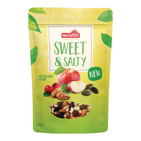 Verpackung mit dem Aufdruck 'nectaflor SWEET & SALTY NEW' und Abbildungen von Apfel, Mandeln, Cranberries und Kürbiskernen