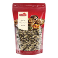 Rote Verpackung mit transparentem Sichtfenster, gefüllt mit einem Mix aus verschiedenen Kernen, darauf ein Etikett mit der Aufschrift 'nectaflor Kernen-Mix Mélange de graines Kernel Mix'