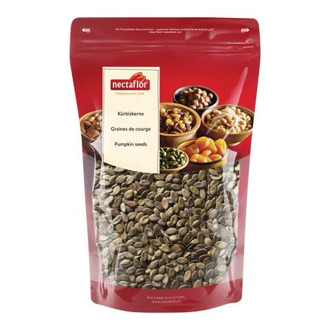 Rote Verpackung mit durchsichtigem Fenster, das Kürbiskerne zeigt, mit dem Markenlogo 'nectaflor' und der Aufschrift 'Kürbiskerne Graines de courge Pumpkin seeds'