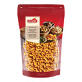 Verpackung mit Sambal-Oelek-Cashewkernen von Nectaflor Artisanal. Roter Standbeutel mit Sichtfenster, gefüllt mit würzig gerösteten Cashewkernen. Aufdruck mit verschiedenen Nüssen, Kernen und Trockenfrüchten.