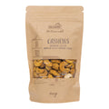 Verpackung mit Cashewkernen Sambal Oelek von Nectaflor Artisanal. Brauner Standbeutel aus Kraftpapier mit Sichtfenster, gefüllt mit würzig gerösteten Cashewkernen. Verpackung mit handgezeichnetem Motiv und Inhalt von 100 g.