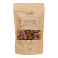 Braune Verpackung mit transparentem Sichtfenster, darin Mandeln, Aufdruck mit Turmzeichnung und Text 'nectaflor Artisanal MANDELN TOMATE ROSMARIN AMANDES TOMATE ROMARIN 100g'
