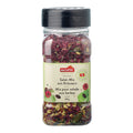 Plastikbehälter mit schwarzem Deckel gefüllt mit getrocknetem Salat-Mix und Kräutern, Etikett mit der Aufschrift 'nectaflor Schweizer Salat-Mix mit Kräutern Mix pour salade aux herbes suisse 280g'