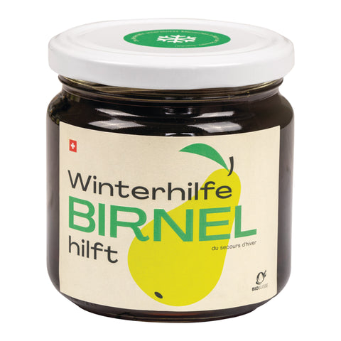 Glas mit weissem deckel gefüllt mit dunklem Birnel