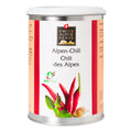Dose mit Alpen-Chili von Swiss Alpine Herbs, darauf Abbildungen von Chilischoten und Kräutern