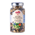 Glas mit Salat-Mix ‚fruchtig & kernig‘ von nectaflor. Die Mischung enthält Kerne, getrocknete Früchte und essbare Blüten. Auf dem Etikett sind Salatblätter und Blumen abgebildet. Inhalt: 110 g.