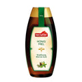 Honigflasche der Marke nectaflor mit Aufschrift 'Honig Miel Waldhonig Miel de forêt' und Abbildung von Tannenzapfen und Blättern