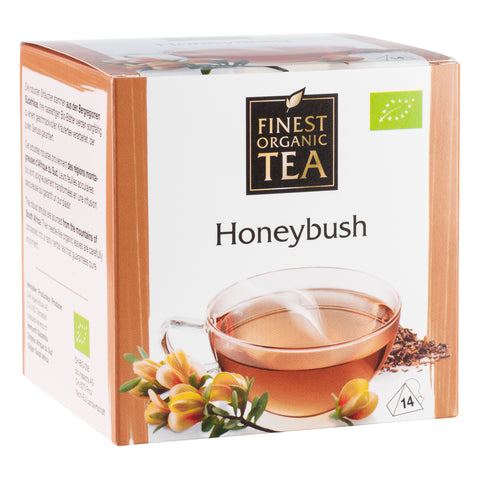 Verpackung des Honeybush-Tees von Finest Organic Tea. Weiße Teeschachtel mit beigefarbenen Akzenten, Abbildung einer Tasse Honeybush-Tee, Honeybush-Blüten und 14 Teebeuteln.