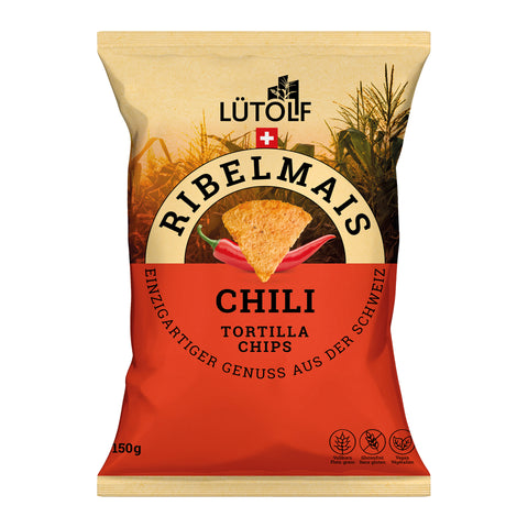 Rote Verpackung mit Ribelmais Chili Tortilla Chips von Lütolf.