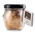 Kleines Glas gefüllt mit Alpensatz und Alpenchilli stücken mit schwarzem Deckel